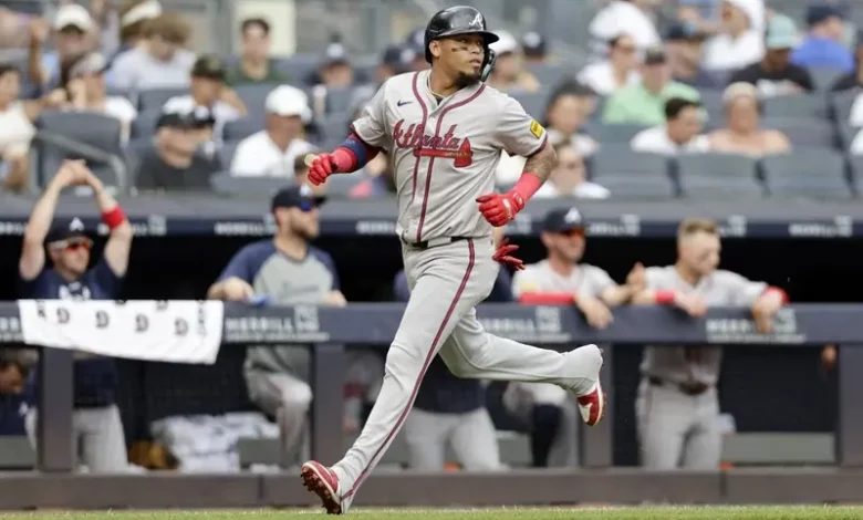 Orlando Arcia #11 of the Atlanta Braves scores a run during the fifth inning against the New York Yankees at Yankee Stadium on June 23, 2024 in New York City