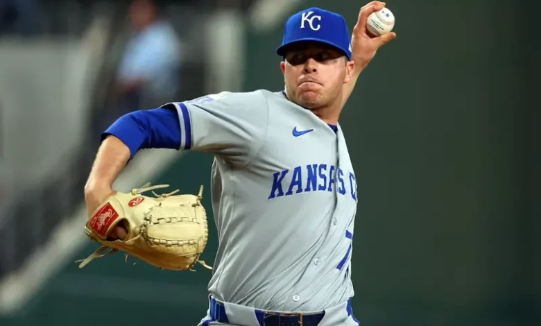 Sam Long #73 of the Kansas City Royals pitches against the Texas Rangers int he sixth inning at Globe Life Field on June 23, 2024 in Arlington, Texas.