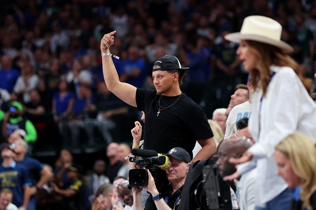 Patrick Mahomes of the Kansas City Chiefs cheers during Game Three of the 2024 NBA Finals between the Boston Celtics and the Dallas Mavericks at American Airlines Center on June 12, 2024 in Dallas, Texas.