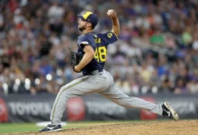 Starting pitcher Colin Rea #48 of the Milwaukee Brewers throws against the Colorado Rockies in the seventh inning at Coors Field on July 03, 2024 in Denver, Colorado