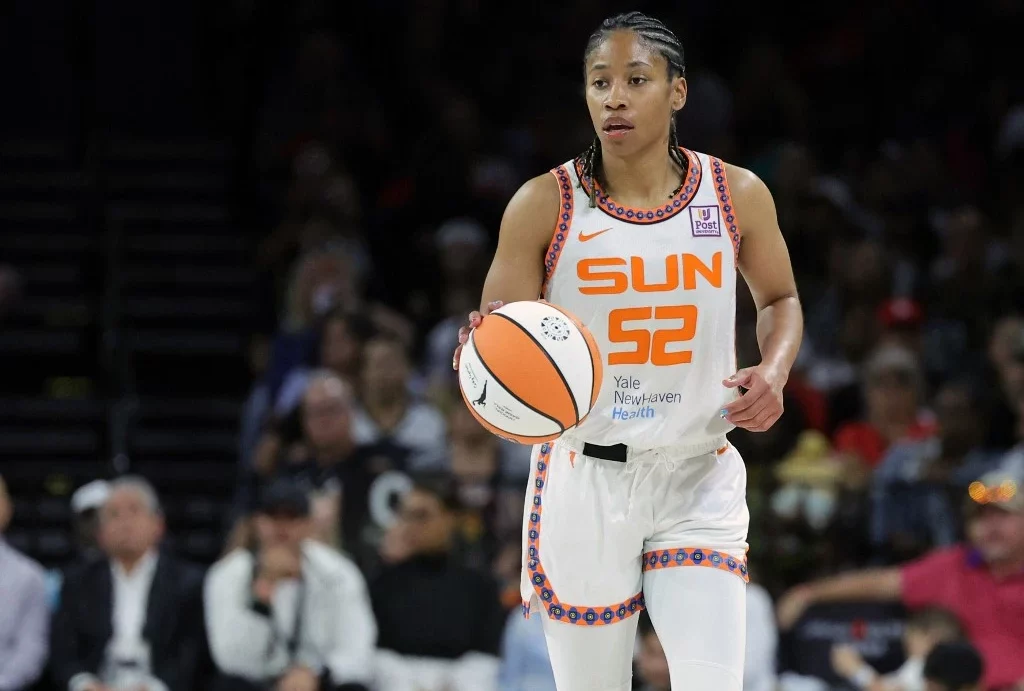Tyasha Harris #52 of the Connecticut Sun brings the ball up the court against the Las Vegas Aces in the second quarter of their game at Michelob ULTRA Arena on June 21, 2024 in Las Vegas, Nevada. The Aces defeated the Sun 85-74
